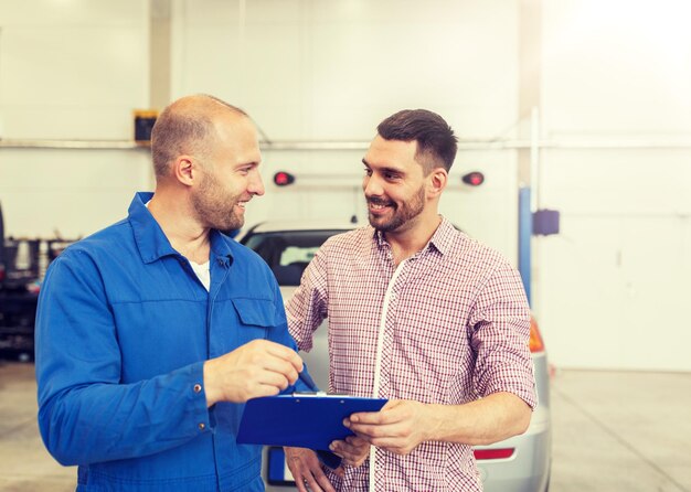 auto-mechanic-with-clipboard-man-car-shop